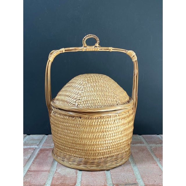 Vintage Chinese lidded Wedding Basket features hand-woven rattan and bamboo with a domed removeable lid. Beautiful golden...