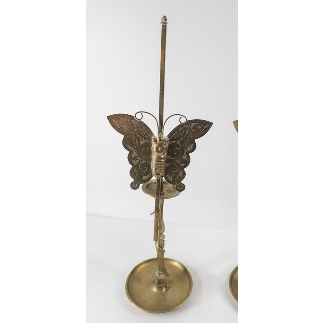 We are selling this nice decorative pair of brass candlestick holders. The candlestick holders come apart in many pieces...