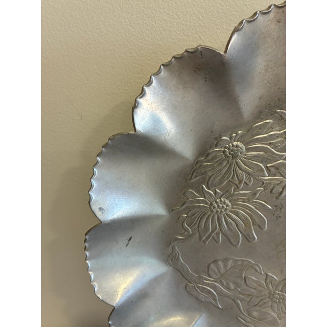 A distinctive vintage hand wrought aluminum tray by Farber & Shlevin, featuring a ruffled scalloped petal-edge border and...