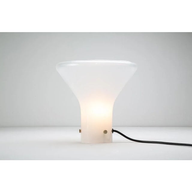 Transparent blown glass body with lattimo glass in Incalmo. Skipper Polux production period 1980 Dimensions Diam. 24 - H....