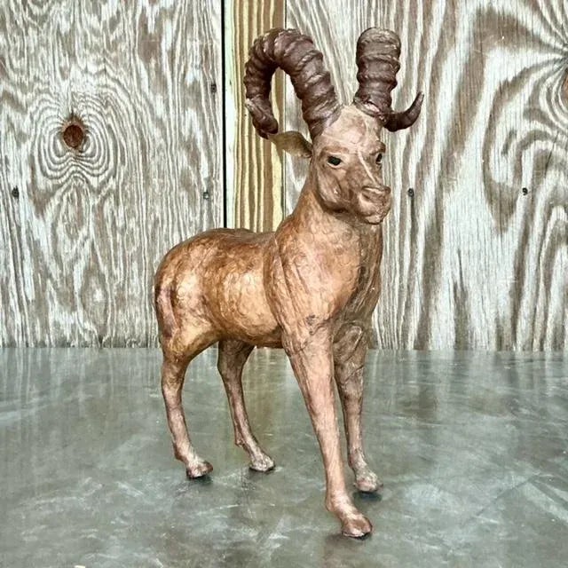 This vintage leather ram exudes a rustic charm, perfect for adding a touch of nature-inspired decor to any space....