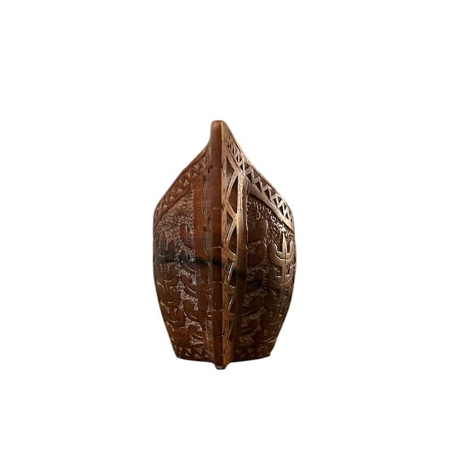 A lovely, hand carved Yugoslavian wedding cup. Features a hand carved, wooden cup with intricately tooled patterns and a...