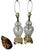 A striking matched pair of circa 1920s European cut crystal table lamps, featuring beautifully proportioned urn-form...