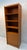 Classic Danish modern bookcase crafted in teak, featuring warm wood tones, rich natural grain, and clean Scandinavian...