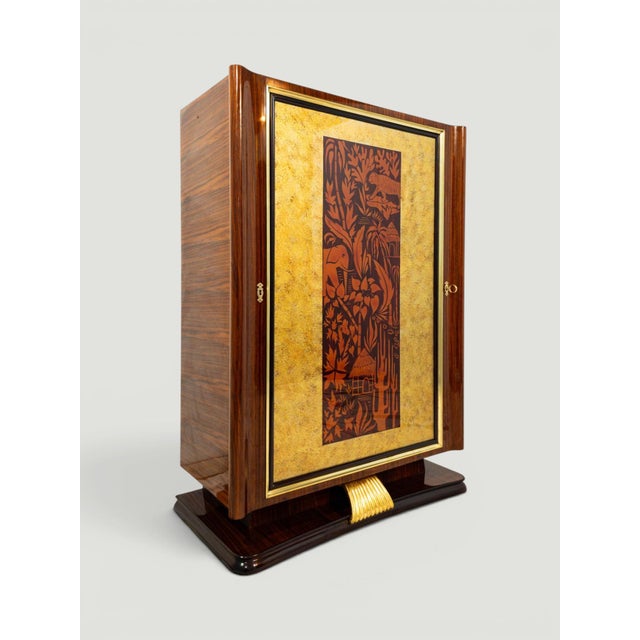 This magnificent dry bar cabinet, designed by Vittorio Dassi and produced in Italy during the 1950s, is an extraordinary...