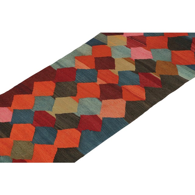 This vintage 3x8 Persian Kilim is a tribal runner we believe hails from the Karadagh region. Handwoven in wool, it...