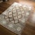 A Vintage Kurdish Rug in Soft Pink and Earthy Browns This remarkable vintage Kurdish rug is a celebration of quiet...