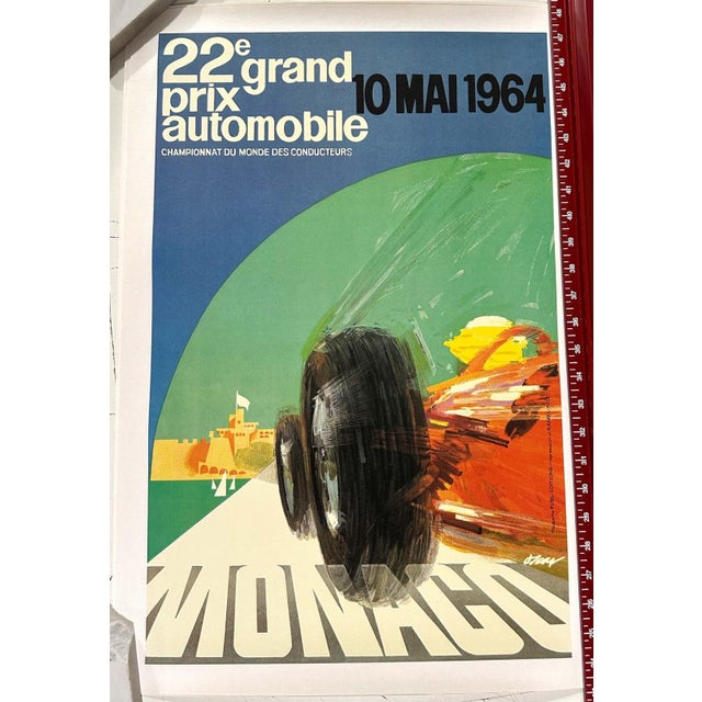 Monaco Grand Prix 1964 poster signed J May The 1964 Monaco Grand Prix was an electrifying event held on May 10 as the...