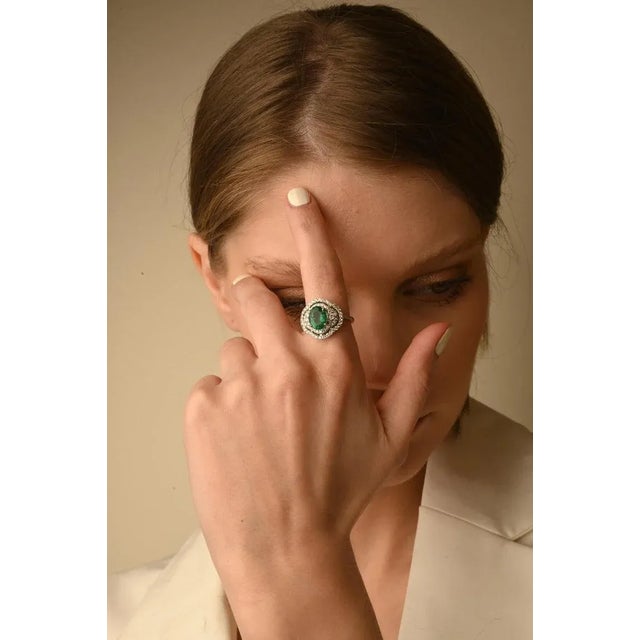 Emerald and Diamond Regalia Ring in 14K Gold featuring natural emerald of 1.92 carats and diamonds of 0.95 carats. The...