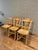 This set of 6 fruitwood chairs offers a beautiful provincial look in a classic style. Chairs feature rush seats and...