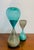 Pair of aquamarine and grey murano glass hourglasses by paolo venini & fulvio bianconi & paolo venini. One large and one...