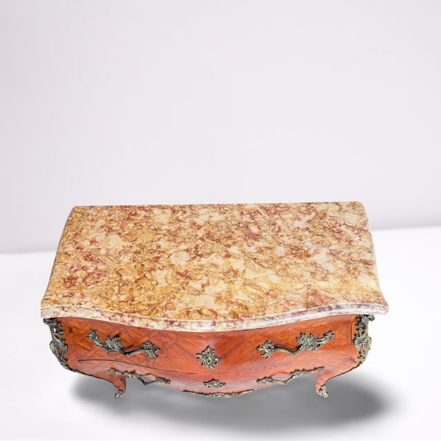 Mid 19th Century Louis XV Marble Top Commode with parquetry in fruitwood. Stunning brèche d'alep marble is a pale creamy...