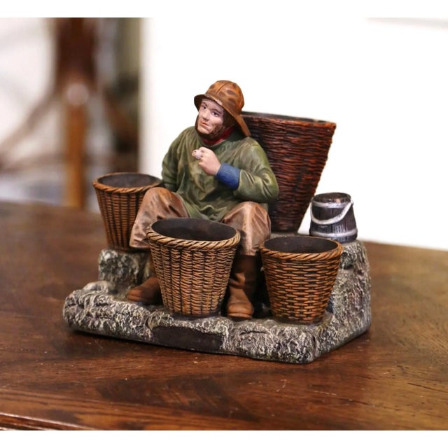 This antique earthenware composition sculpture was created in France, circa 1880. The "terre cuite" figure (aka...