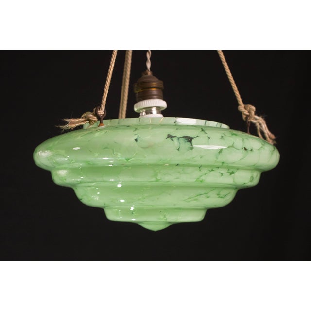 Stunning Murano glass pendant in green colour. Art Deco style: period of manufacture 1940-1950. The disc of the chandelier...