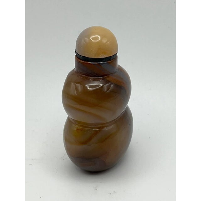 The double gourd carries more significance than an interesting shaped vegetable. It is a magical object, and it's ability...