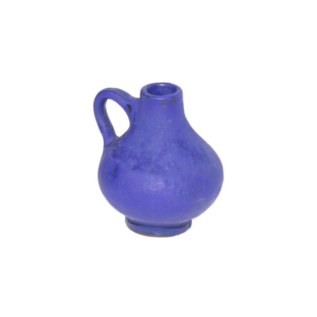 A West German blue ceramic vase jug by Töpferie Hartwig Heyne, also known as Hoy. This dark blue ceramic vase features a...