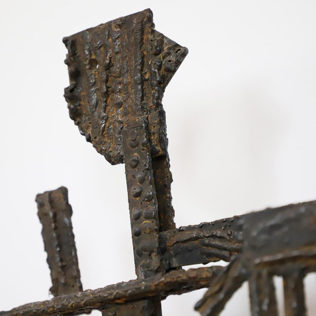 Circa 1960. We offer this Brutalist brass wall sculpture in abstract man form, the sculpture has a perfect manufacturing a...