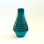 A mid century pottery candle holder in the shape of a bird. Lovely texture and variation to the blue glaze. Accented by...