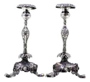 Silver Candlesticks with Floral Motifs