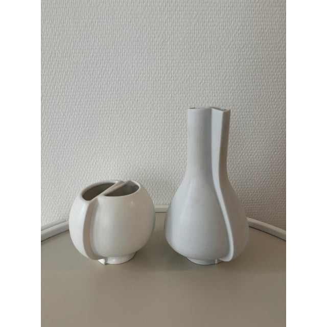 A rare set of four stoneware pieces from the surrea series, designed in 1940 by wilhelm kåge for gustavsberg. This set...