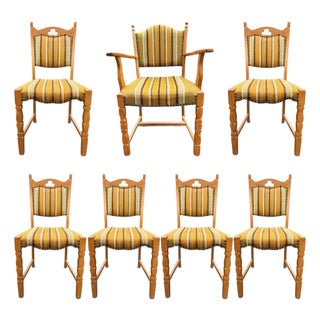 Set of Seven Danish Oak Dining Chairs by Henning Kjærnulf For Sale