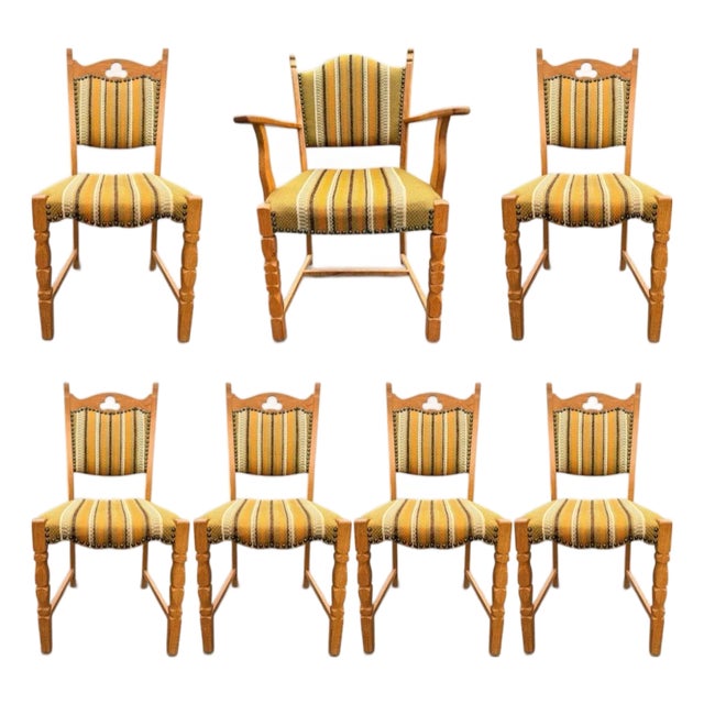Set of Seven Danish Oak Dining Chairs by Henning Kjærnulf For Sale