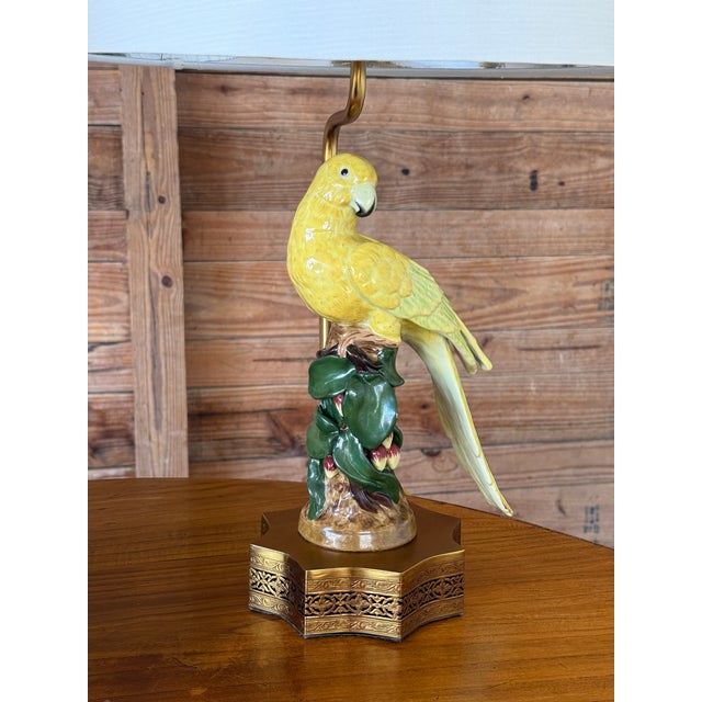 Pair of vintage Jeanne Reed figural porcelain parrot table lamps, beautifully hand-painted in vibrant yellow with green...