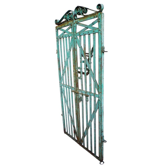 Beautiful vintage iron work gate from India. Original turquoise painted finish with lots of charm and character. Signs of...
