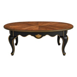 Vintage Oval Coffee Table – Bookmatched Veneer Top in Satin Walnut With Black & Gold Gilded Base – 48" W For Sale
