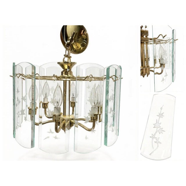 Elegant Mid-Century Chandelier: Timeless Luxury for Your Home This chandelier exudes a classic, timeless aesthetic. The...