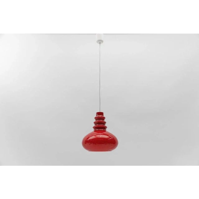 Lovely lipstick red glass ceiling lamp by peill & putzler, 1960s the lamp need 1x e27 / e26 edison screw fit bulb, is...
