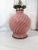 Sweet swirl pink reverse painted blown glass oil lamp. Displayed but never used, new wick included, also glass chimney...