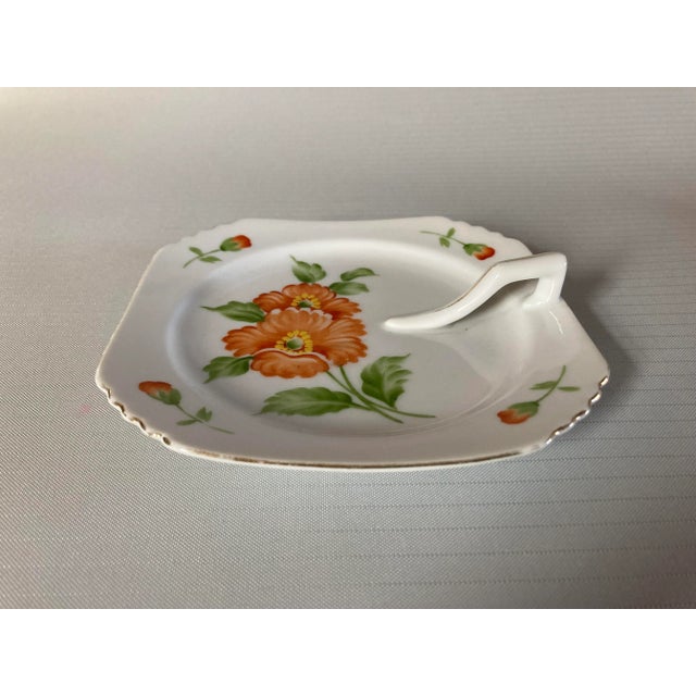 Vintage hand painted floral porcelain candy dish with handle ,5.75" X 5.75" makers mark reads "Hand painted Made In...