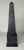 A well proportioned, black and grey faux-marbled obelisk with metals mounts. The marbling detail is clear and ads to the...