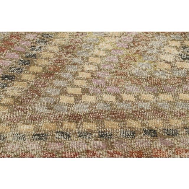 Made with hand-knotted wool in Turkey circa 1960-1970, this 5x8 vintage rug is an exciting new addition to Rug & Kilim’s...