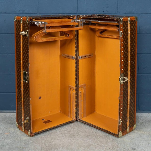 An exceptional Louis Vuitton double hanging wardrobe trunk dating to circa 1930, crafted in the iconic Monogram canvas...