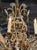 This Vintage Italian Beaded and Amber Chandelier is a beautifully designed lighting fixture that adds a touch of elegance...