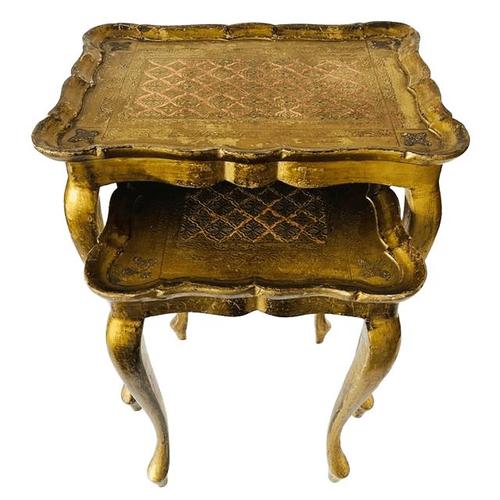Vintage Florentine side table set in gold and pink from the 1970s. This nesting set was made in Italy in the 1950s. Bring...