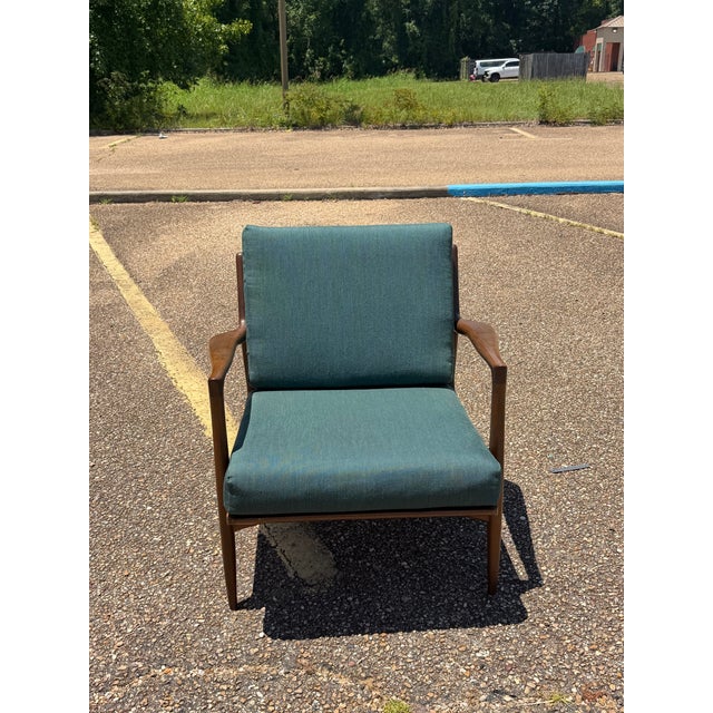 Kofod Larsen for Selig Mid-Century Danish Walnut Lounge Chair A true icon of Danish Modern design. Designed by Ib Kofod-...