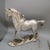 Add a touch of equestrian elegance and dynamic movement to your decor with this striking vintage horse sculpture. Crafted...