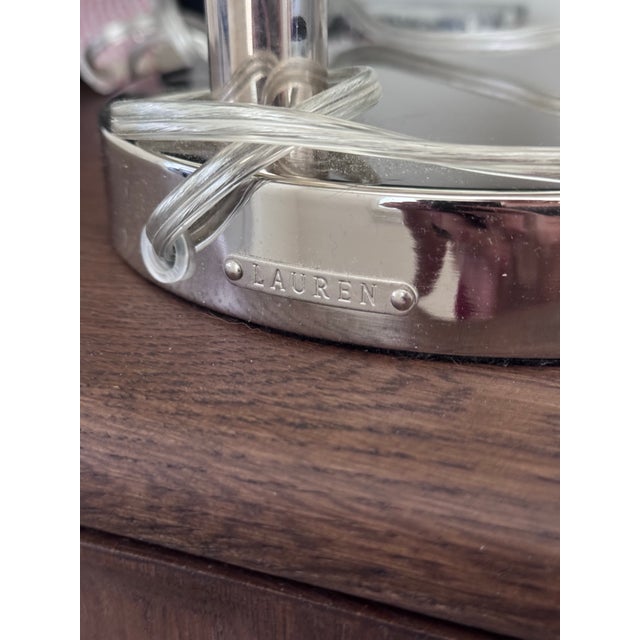 Ralph Lauren polished chrome articulating swing-arm table lamp with original white drum shade. Features an adjustable...