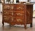 Decorate a living room or entry with this elegant antique "Commode Lyonnaise". Crafted in Lyon, France circa 1760, the...