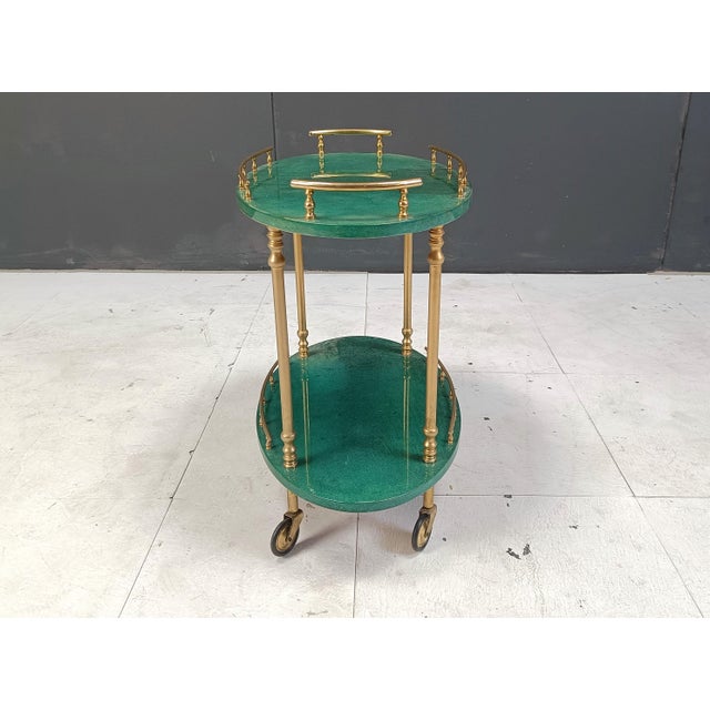 Italian Lacquered Goatskin Swan Bar Cart and Wine Bottle Stand by Aldo Tura, 1960s, Set of 2, in Very Good conditions....