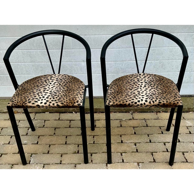 Pair of stylish 1960s-70s chairs by BKS, Denmark . Black tubular metal frame with plush anymal print upholstery. Stackable.