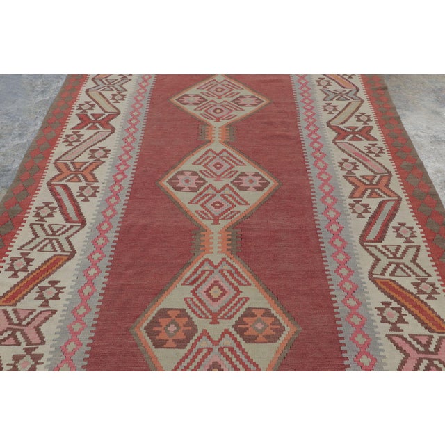 Hand-knotted in wool, this 6x14 contemporary Samarkand runner rug, originating circa 1950-1960 from China, is a...