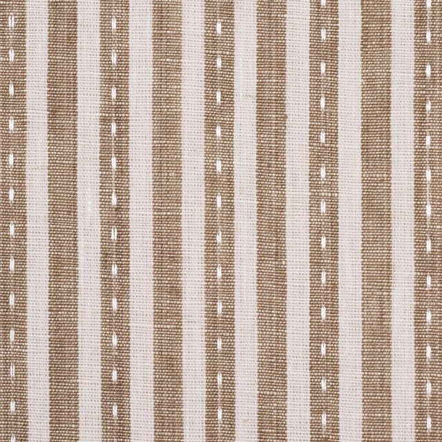 Printed on a linen-hemp blend with a running-stitch detail, Mathis Ticking Stripe is an interesting, textural take on...