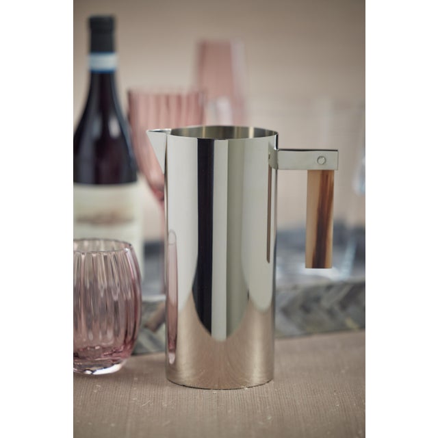 This exquisite "Brockley Pitcher with Horn Handle" is a stunning addition to any home décor. Made from high-quality steel,...
