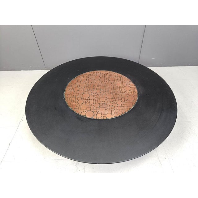 Vintage coffee table designed by Herbert Hirche for Rosenthal, in the 1970s. The table consists of a round black lacquer...