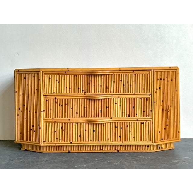 This striking vintage dresser is a masterclass in the Organic Modern aesthetic, showcasing the intricate texture and...