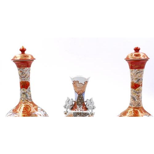 These Japanese Kutani Vases are refined decorative objects realized by a Japanese artist in the 19th century. This...